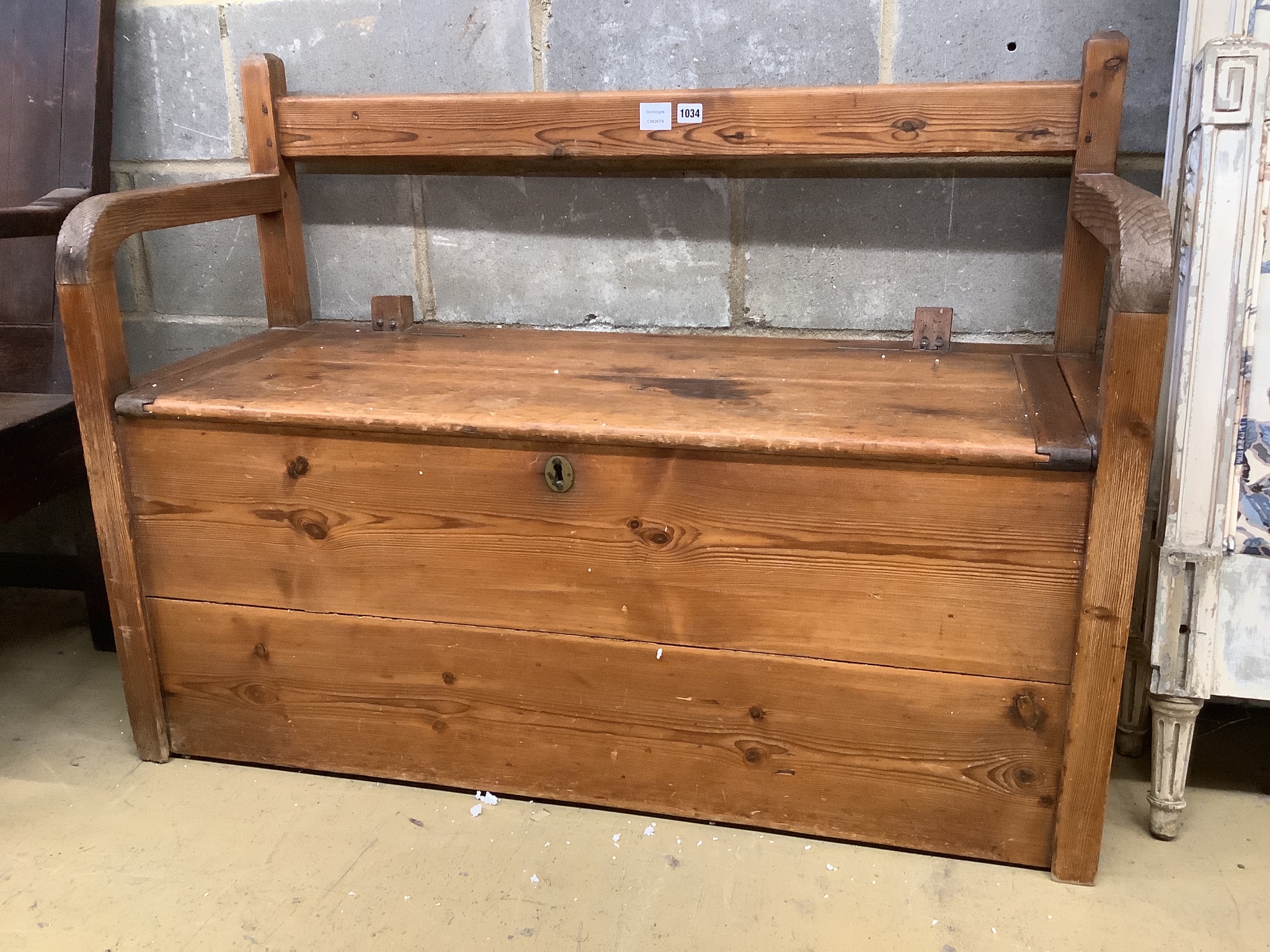 A Victorian stripped pine box settle